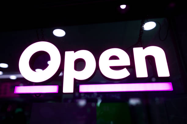 istock Open sign on cafe hang on door 1328619289