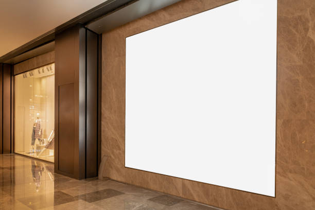istock empty billboard in front of modern fashion store for copy space and mock up. 1328624973