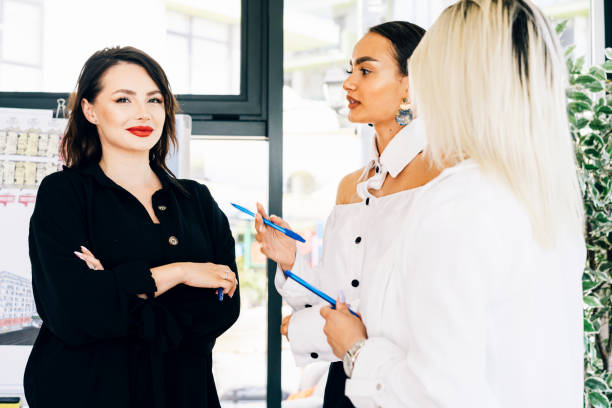 istock Young business colleagues working together at the office 1328627446