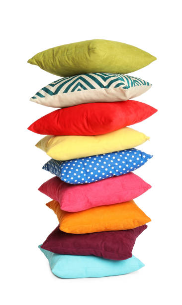 istock Stack of colorful decorative pillows on white background 1328628555