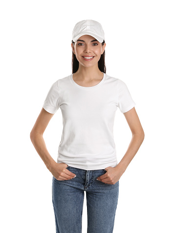 Young happy woman in cap and tshirt on white background. Mockup for design