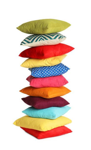 istock Stack of colorful decorative pillows on white background 1328629629