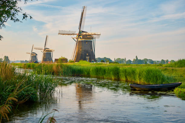 three mills during sunrise - scenics landscape windmill sunrise imagens e fotografias de stock