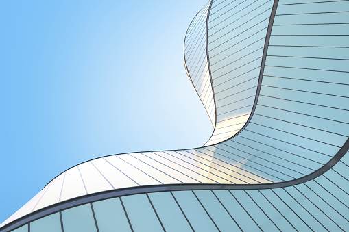 Vista de ángulo bajo de la arquitectura moderna futurista, rascacielos del edificio de oficinas corporativas, forma curva, renderizado 3D. photo
