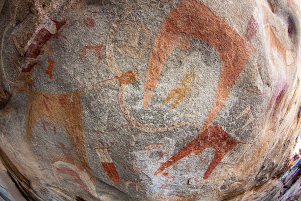 Ancient rock art in Laas Geel, Somaliland Livestock cow and human rock paintings on the surface of the rock hargeysa photos stock pictures, royalty-free photos & images