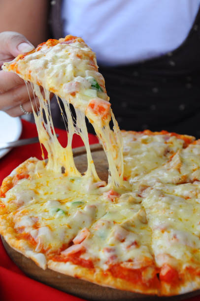 istock close up of pizza 1328636547
