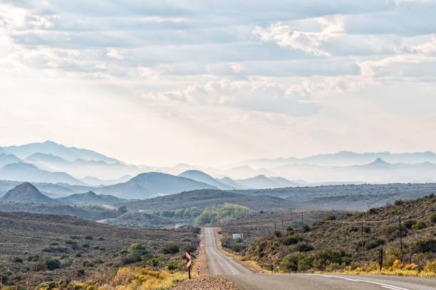 istock Hazy view from road R407 towards Klaarstroom 1328638290