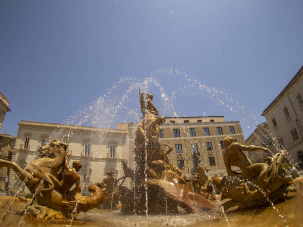 istock archimede place triton fountain syracuse 1328643069