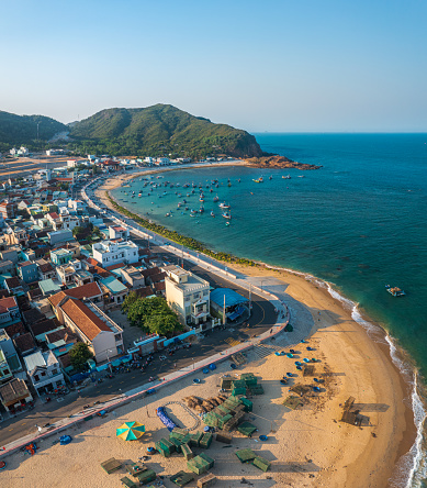 Drone view of Nhon Hai beach, with a fishing village, Quy Nhon city, Binh Dinh province, central Vietnam