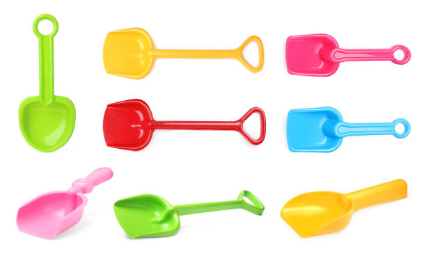 istock Different bright plastic toy shovels on white background, collage 1328646734