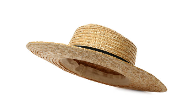 Stylish straw hat isolated on white. Beach accessory Stylish straw hat isolated on white. Beach accessory vogue cover stock pictures, royalty-free photos & images