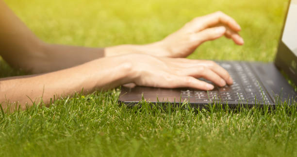 istock Female Hands are typing on the laptop keyboard. 1328646778