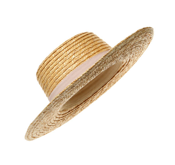 Stylish straw hat isolated on white. Beach accessory Stylish straw hat isolated on white. Beach accessory vogue cover stock pictures, royalty-free photos & images