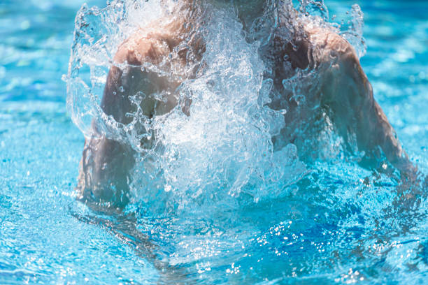 istock Boy in the swimming pool 1328649511