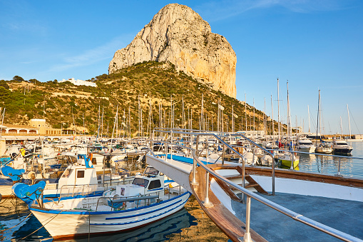 Penon de Ifach and fishing harbor in Calpe city. Spain