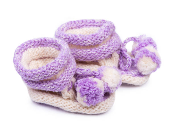 istock Pair of baby bootees 1328652625