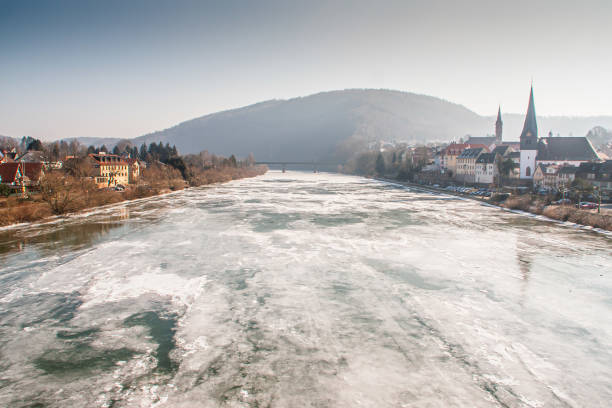 ice in River Neckar in Germany rare occurrence of ice in the river Neckar at Neckargemuend Germany on a cold winter day frozen river stock pictures, royalty-free photos & images