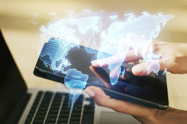 istock Multi exposure of abstract creative digital world map and finger presses on a digital tablet on background, research and analytics concept 1328654031