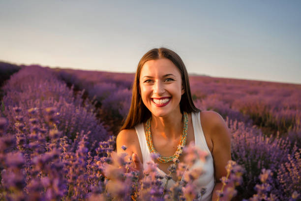 istock Young woman on the field is having a good time 1328654095