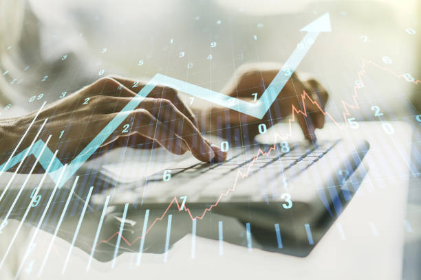 istock Multi exposure of abstract financial graph with upward arrow and hand typing on computer keyboard on background, financial and trading concept 1328654097