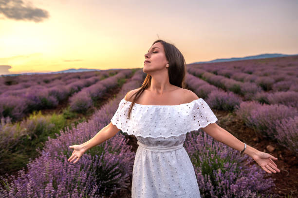 istock Young woman on the field is having a good time 1328654340