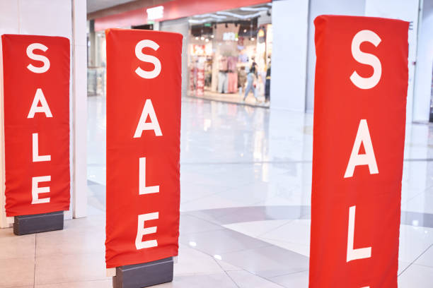 istock Sale red sign at mall. Discount concept 1328656493