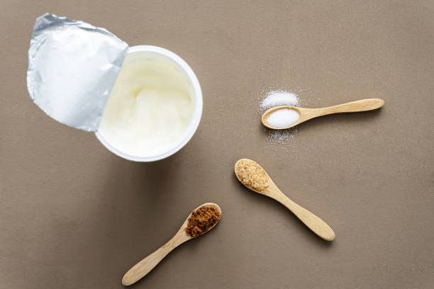 istock A yogurt cup with different types of sugar on spoons 1328656874