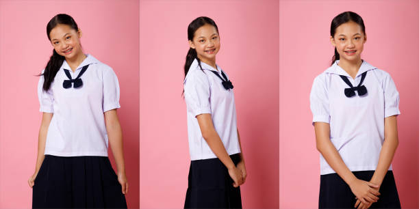 adolescente de 12 à 15 ans, fille asiatique en uniforme d’étudiant chemise blanche - 12 13 years 13 14 years learning education photos et images de collection