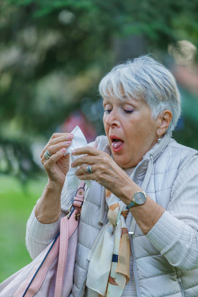 istock Ill Senior Woman Caught a Flu Virus and High Temperature. 1328659575