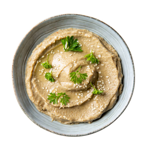 istock Baba ghanoush, babaganush or baba ganoush in gray bowl isolated on white background. Turkish cuisine. Top view. 1328661039