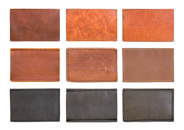 Blank brown leather jeans labels isolated on white background