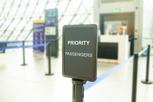 priority passengers sign at airport waiting area