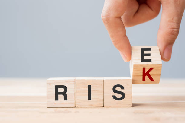 istock Businessman hand flipping wooden cube blocks with RISK change to RISE text on table background. economic, chance, attitude, opportunity and Crisis concepts 1328666028