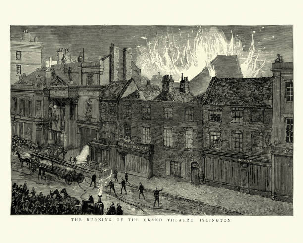 istock Firefighters putting out fire at Grand theatre Islington, Victorian 19th Century, 1888 1328666408