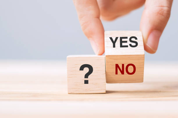 istock Hand change Yes or No block. Answer, question and decision concept 1328666545