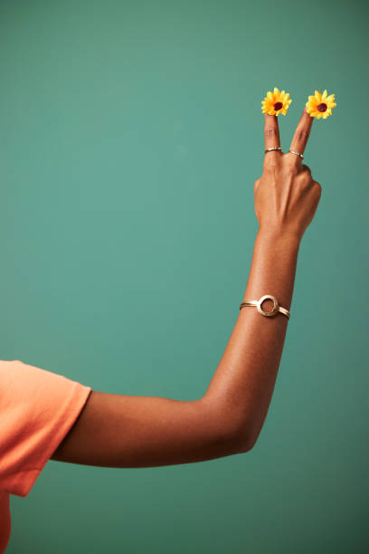 Shot of a hand making a gesture shot against a studio background