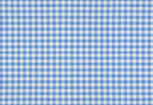 Photo of Blue plaid cotton fabric background