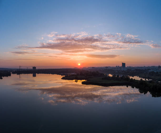 istock Aerial scenic sunrise with clouds on wide river 1328673357