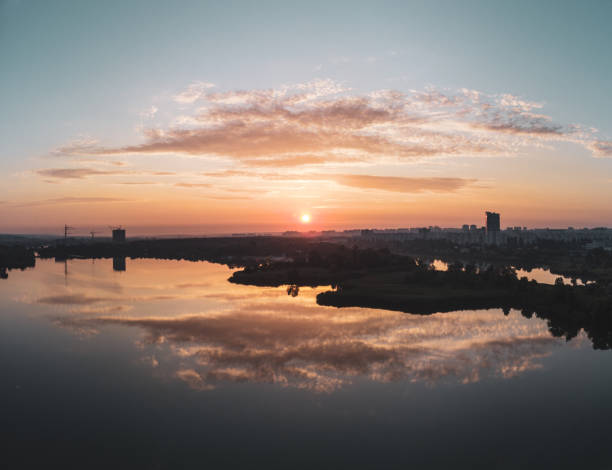 istock Aerial scenic sunrise with clouds on wide river 1328673392