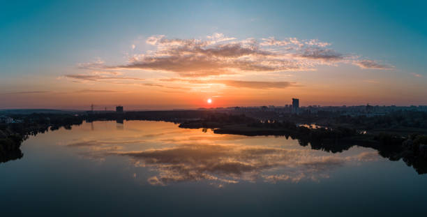 istock Aerial scenic sunrise with clouds on wide river 1328673399