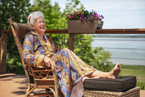 istock Senior woman relaxing on patio 1328674747