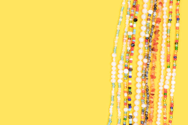 istock Necklaces made from colorful beads and pearls with copyspace. 1328678833