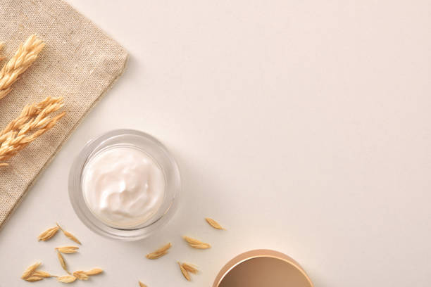 istock Oat moisturizer cream in jar with spikes on white top 1328679972