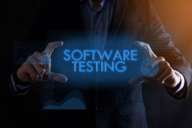istock Business man hands holding inscription software testing with different graphs on the background.successful business concept 1328680160