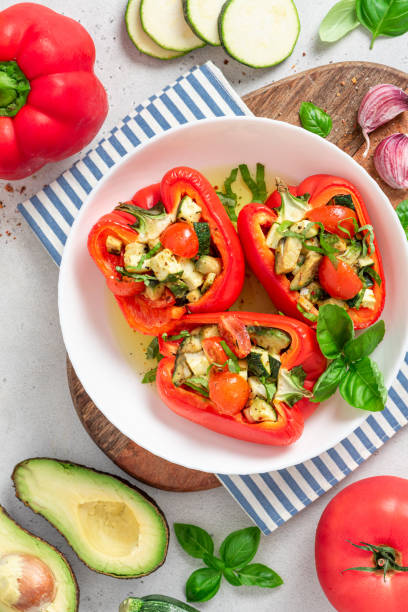 istock Baked peppers stuffed with vegetables 1328680317