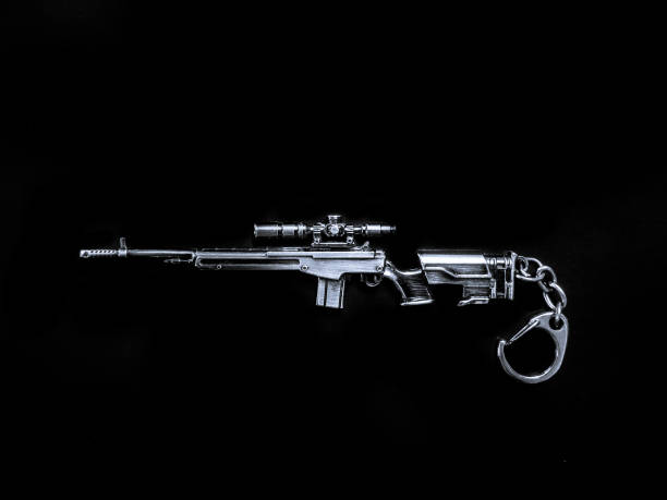istock Weapon keychain isolated on black background 1328682966