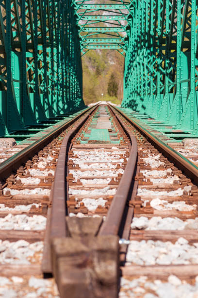 istock Railroad tracks on railway bridge 1328684919