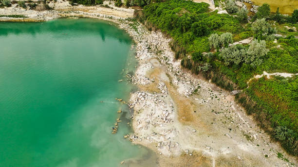 Aerial view of the St. Klimentovsky limestone lake. Inkerman Aerial view of the St. Klimentovsky limestone lake. Inkerman, Crimea inkerman stock pictures, royalty-free photos & images