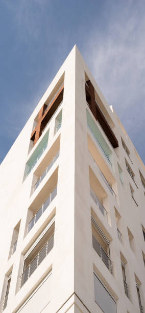 istock Modern hotel or apartment building on sky background 1328686417