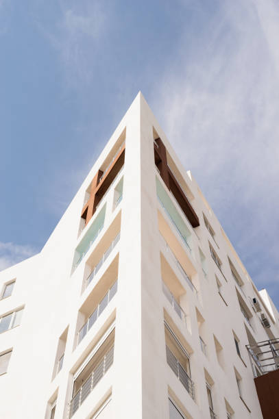 istock Modern hotel or apartment building on sky background 1328686443